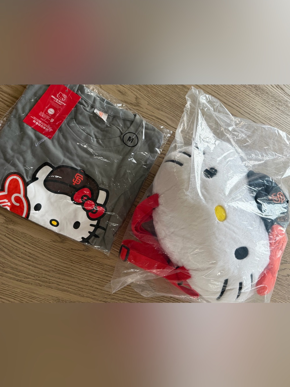 SF Giants 2023 VIP Giveaway Hello Kitty Plush Backpack and T Shirt.
